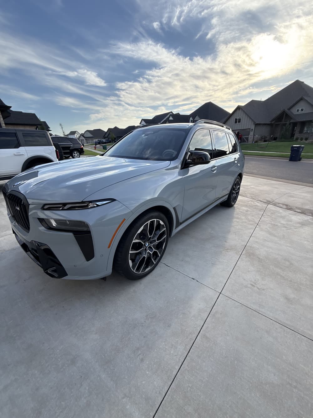 BMW X7 front three-quarter view after exterior hand wash in Edmond OK