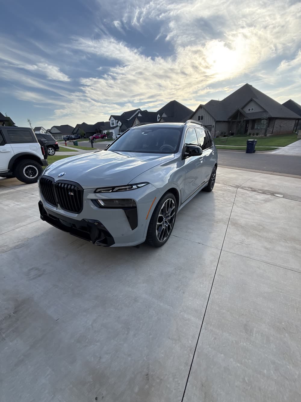 BMW X7 front view on an open driveway after mobile detail in Edmond OK