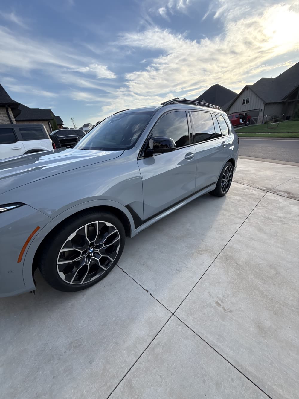 BMW X7 side profile with deep gloss after exterior detail in Edmond OK