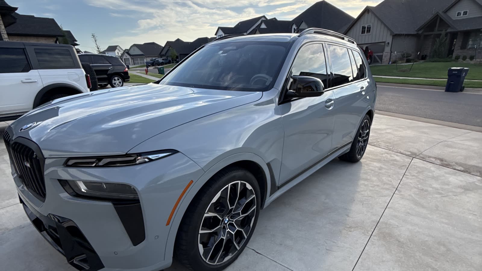 BMW X7 gleaming at golden hour after mobile detailing in Edmond OK